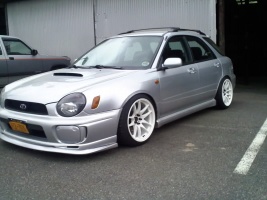 2003 Subaru Impreza with 18x9.5 Rota Torque-R wheels