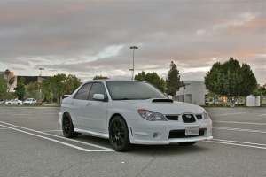 2006 Subaru Impreza with 18x8.5 Rota Torques wheels