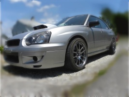 2004 Subaru Impreza with 17x9 Rota Torque wheels