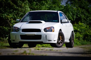 2004 Subaru Impreza with 17x9 Rota DPT wheels