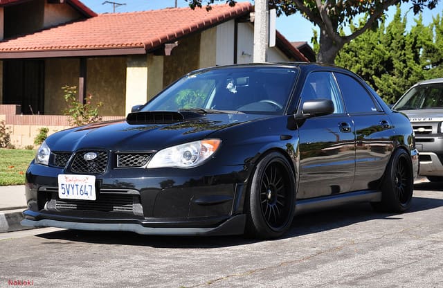 2006 Subaru Impreza with 18x10 Rota SVN-R wheels