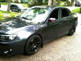 2008 Subaru Impreza with 18x9 Rota G-Force wheels