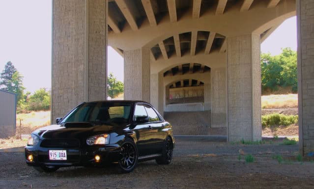 2004 Subaru Impreza with 18x9.5 Rota DPT wheels