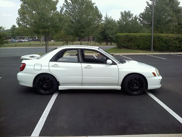 2003 Subaru Impreza with 17x8 Rota G-Force wheels