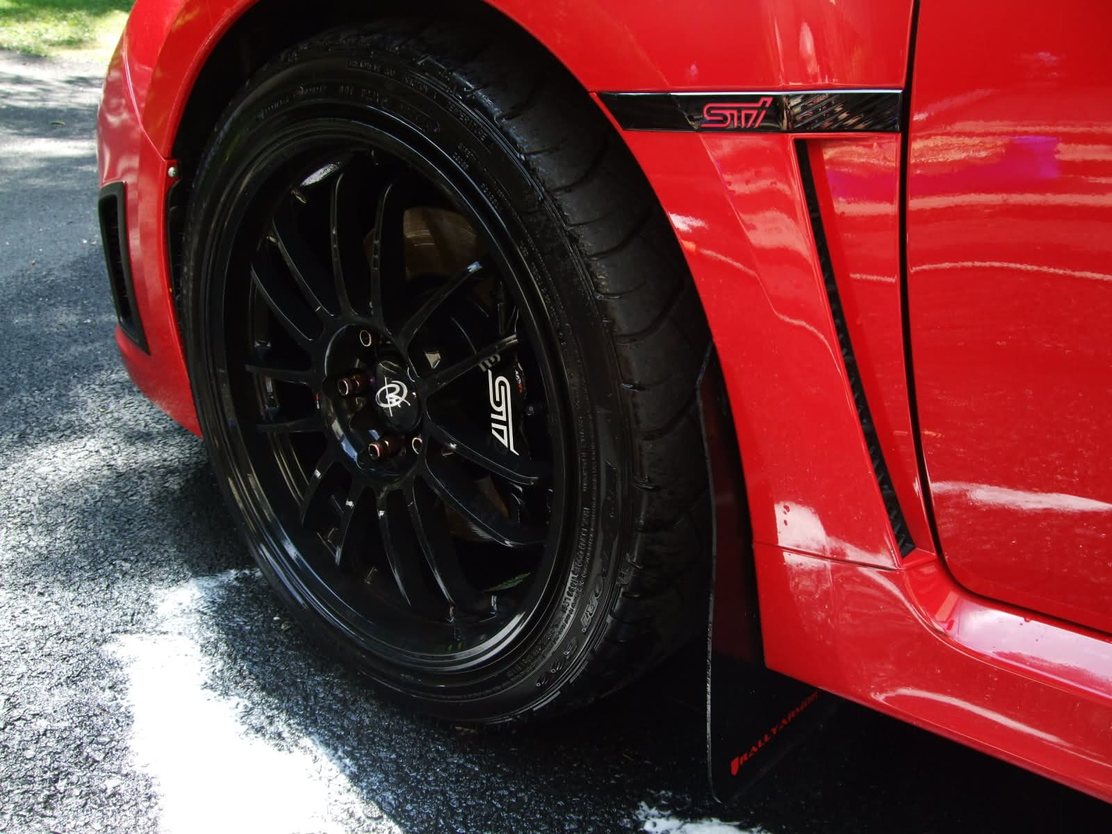2008 Subaru Impreza with 18x9 Rota SVN wheels
