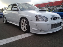 2004 Subaru Impreza with 18x8.5 Rota Grid wheels