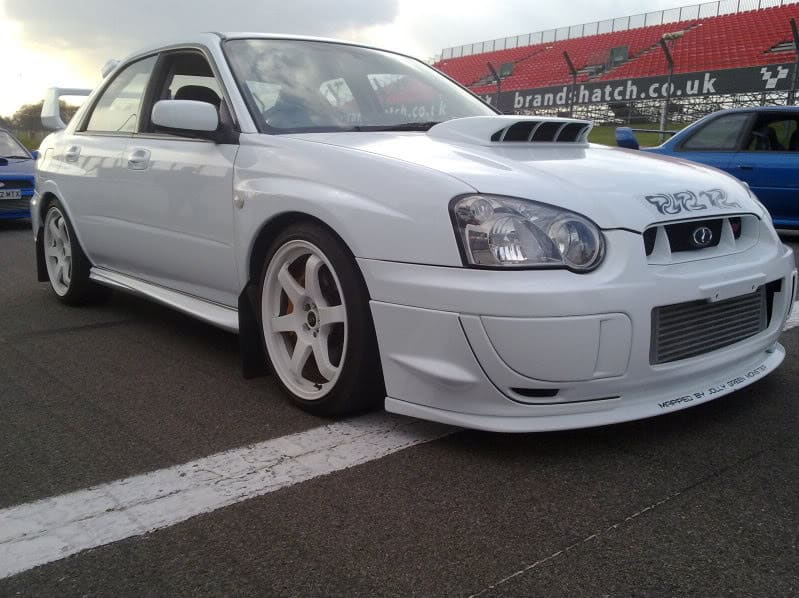 2004 Subaru Impreza with 18x8.5 Rota Grid wheels