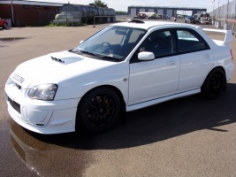 2004 Subaru Impreza with 18x9 Rota Fighter Drifts wheels