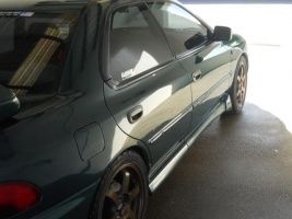 1999 Subaru Impreza with 17x7.5 Rota wheels