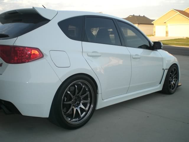 2009 Subaru Impreza with 18x9.5 Rota DPT wheels