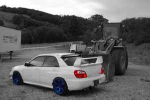 2004 Subaru Impreza with 18x9.5 Rota Grid wheels