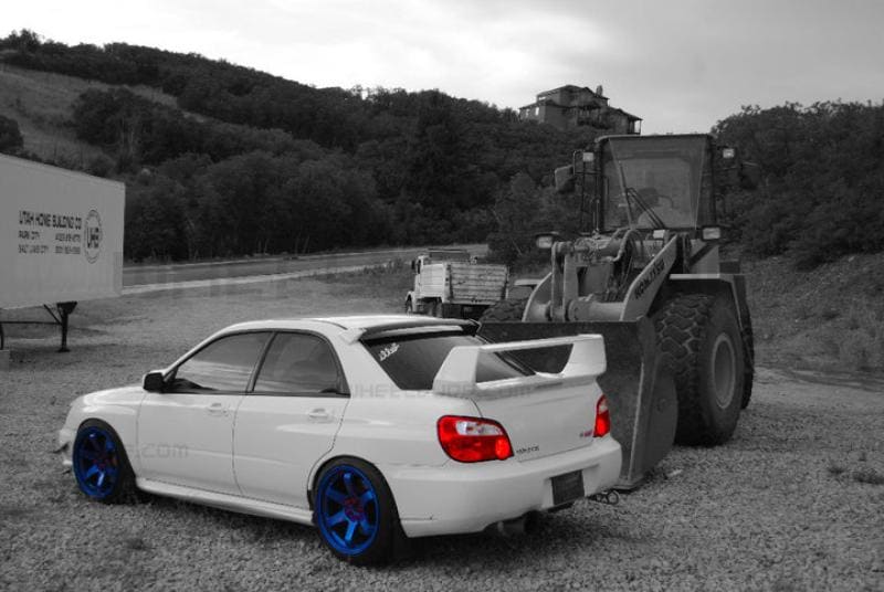 2004 Subaru Impreza with 18x9.5 Rota Grid wheels