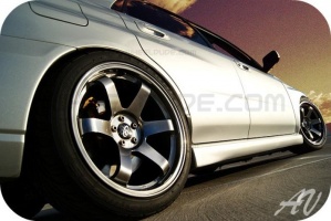 2004 Subaru Impreza with 18x9.5 Rota Grid wheels