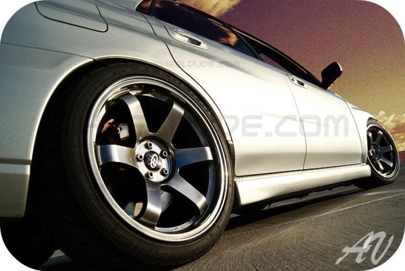 2004 Subaru Impreza with 18x9.5 Rota Grid wheels
