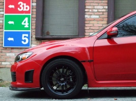 2010 Subaru Impreza with 18x9 Rota SVN wheels