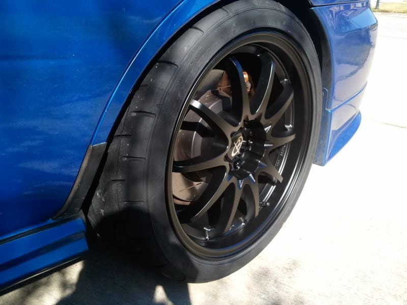 2009 Subaru Impreza with 18x9 Rota DPT wheels