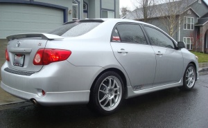 2009 Toyota Corolla with 17x8 Enkei PF01 wheels