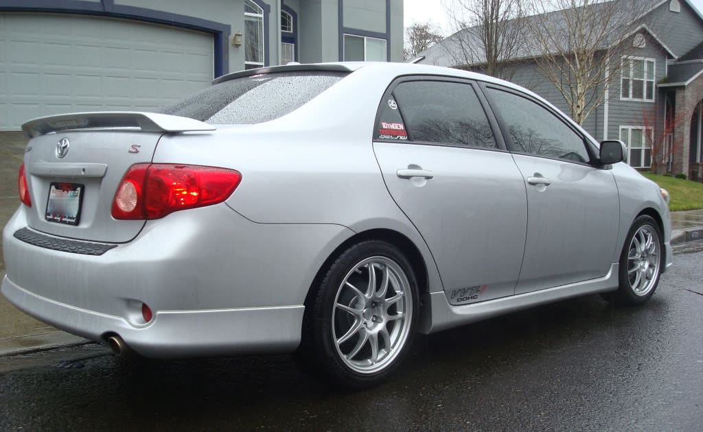 2009 Toyota Corolla with 17x8 Enkei PF01 wheels