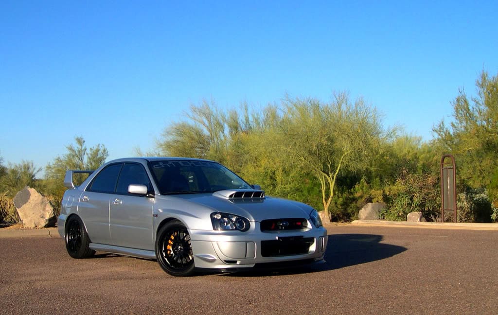 2004 Subaru Impreza with 18x9 Rota SVN wheels