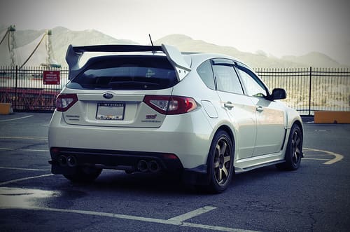 2006 Subaru Impreza with 18x8.5 Rota Grid wheels