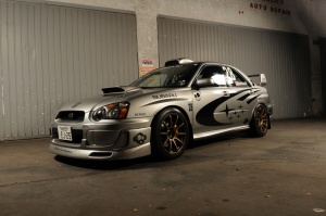 2004 Subaru Impreza with 18x9 Rota G-Force wheels