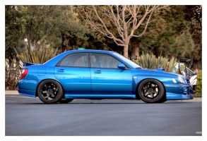2003 Subaru Impreza with 18x8.5 Rota Grid wheels