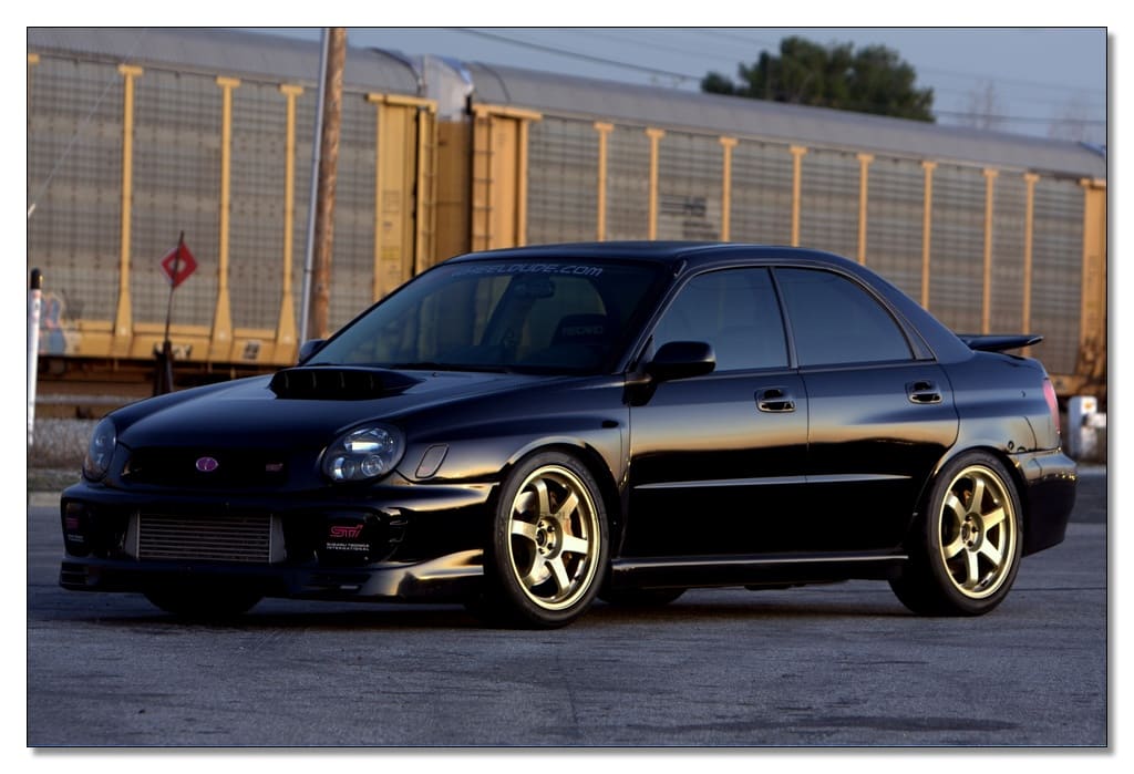 2003 Subaru Impreza with 18x8.5 Rota Grid wheels