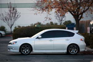 2010 Subaru Impreza with 18x8.5 Rota Grid wheels