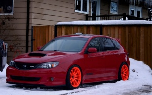 2009 Subaru Impreza with 18x9.5 Rota Torque-R wheels
