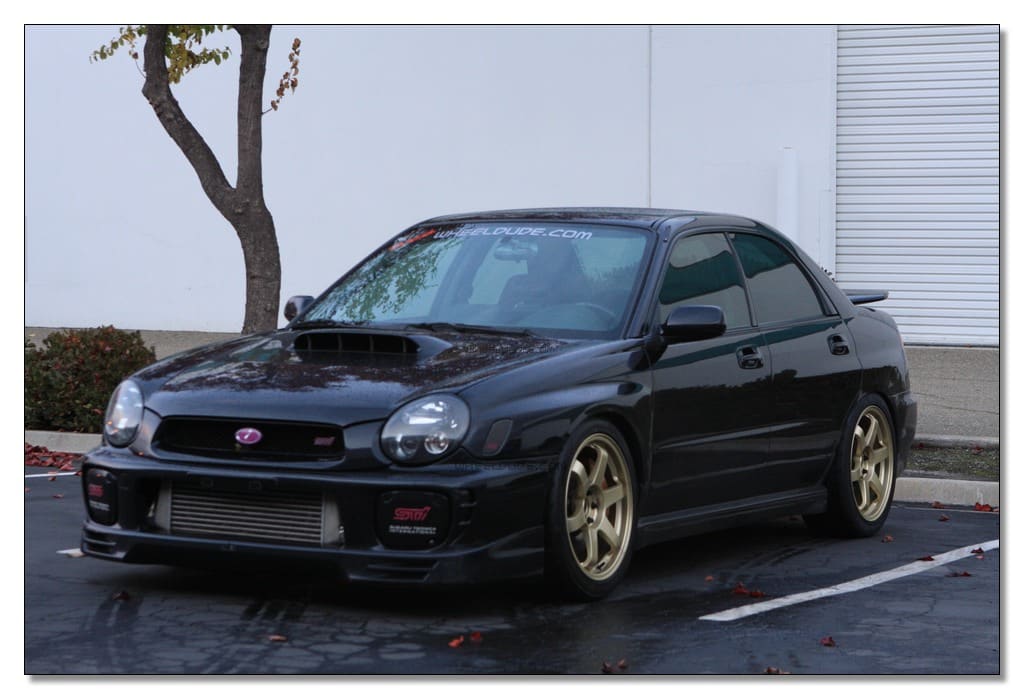 2003 Subaru Impreza with 18x8.5 Rota Grid wheels