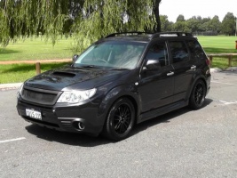 2009 Subaru Forester with 18x8.5 Rota SVN wheels