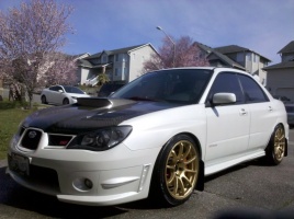 2008 Subaru Impreza with 18x9 Rota G-Force wheels