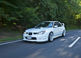 2006 Subaru Impreza WRX STi with 18x9.5 Enkei NT03+M wheels