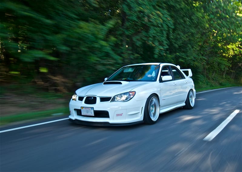 2006 Subaru Impreza WRX STi with 18x9.5 Enkei NT03+M wheels