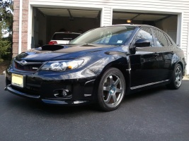 2011 Subaru Impreza with 18x8.5 Rota Grid wheels