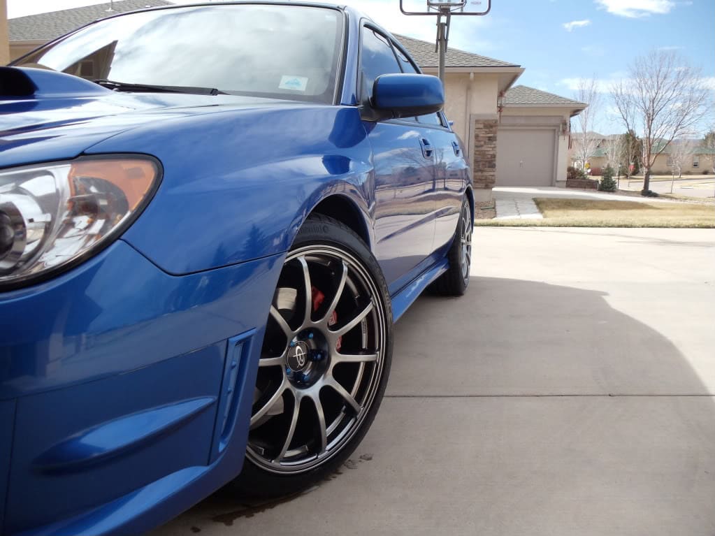 2007 Subaru Impreza with 18x8.5 Rota G-Force wheels