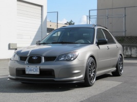 2006 Subaru Impreza with 17x9 Rota DPT wheels