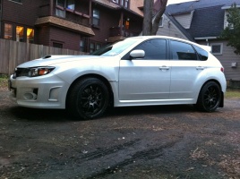 2011 Subaru Impreza with 18x9.5 Rota D-Force wheels