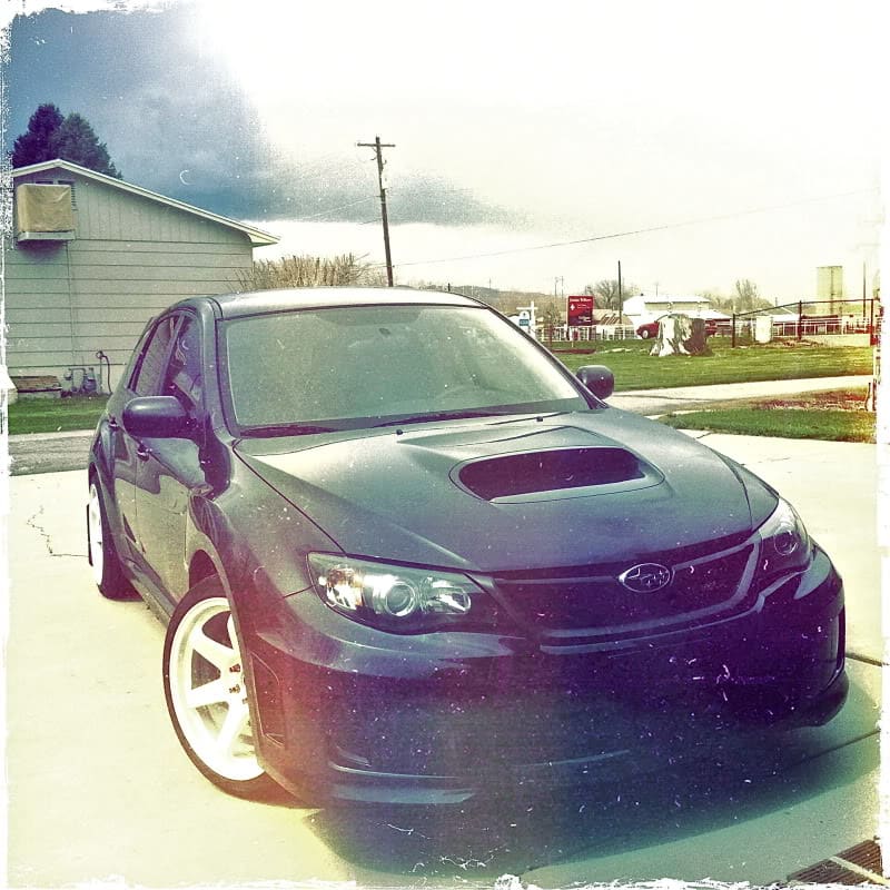 2011 Subaru Impreza with 18x9.5 Rota Grid wheels