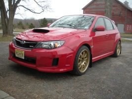 2011 Subaru Impreza with 18x9.5 Rota D-Force wheels