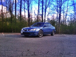 2009 Subaru Impreza with 18x8.5 Rota SVN wheels