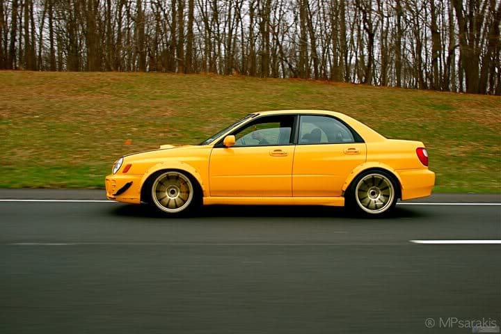 2003 Subaru Impreza with 18x9 Rota G-Force wheels
