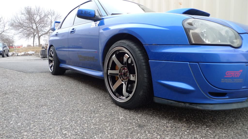 2004 Subaru Impreza with 18x9.5 Rota Grid wheels