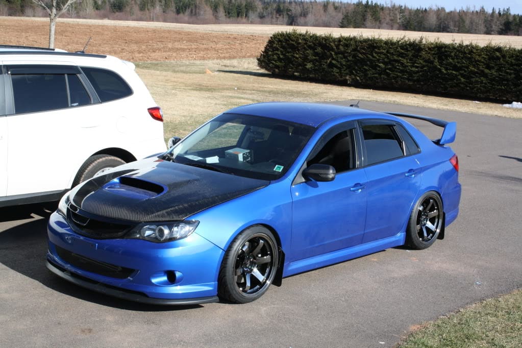 2009 Subaru Impreza with 18x9.5 Rota wheels