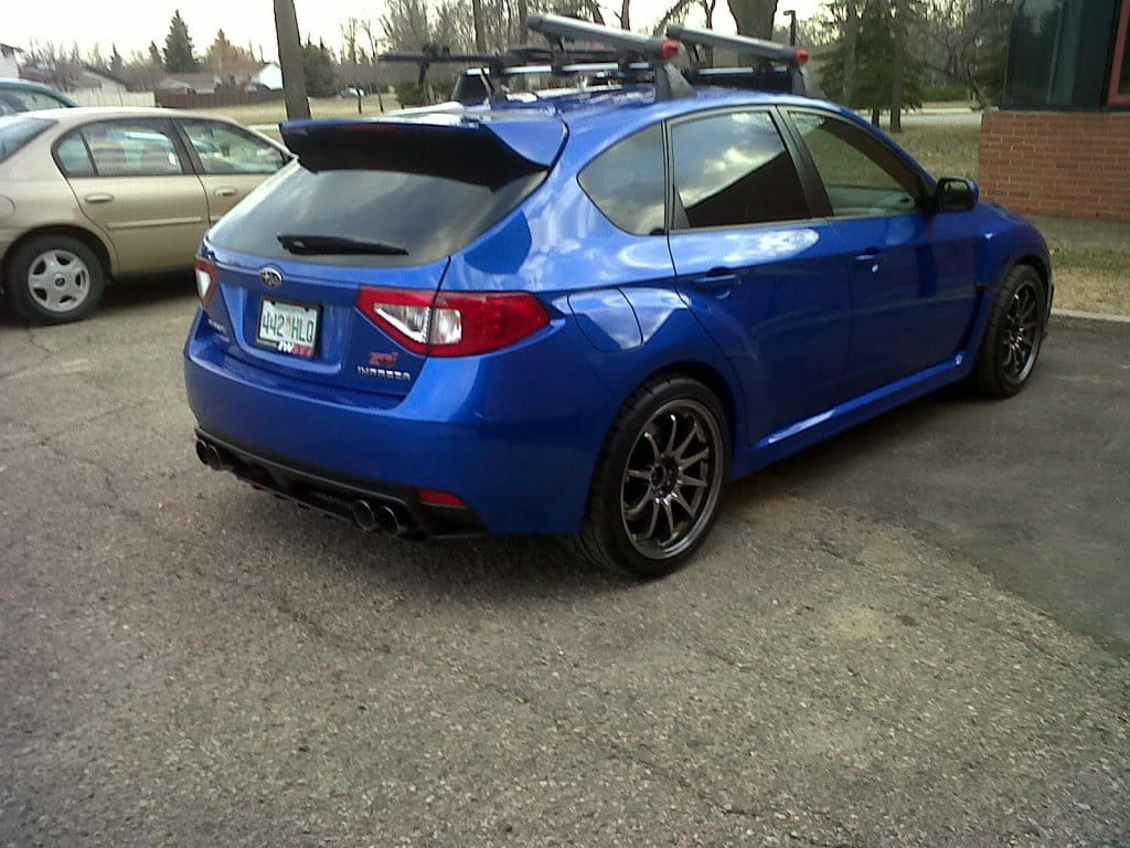 2011 Subaru Impreza with 18x9.5 Rota DPT wheels