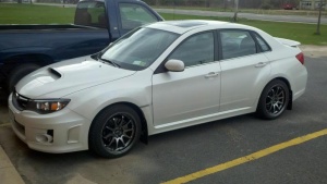 2009 Subaru Impreza with 18x9.5 Rota DPT wheels