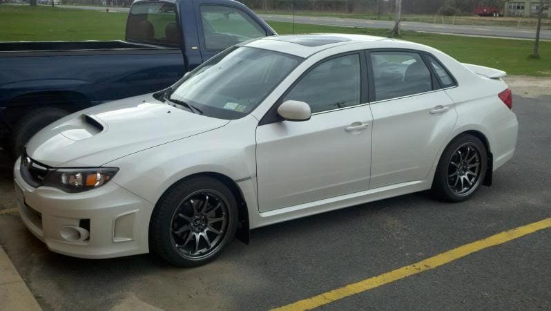 2009 Subaru Impreza with 18x9.5 Rota DPT wheels
