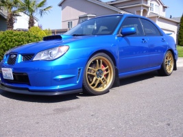 2007 Subaru Impreza with 18x8.5 Rota Subzero wheels