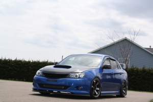 2009 Subaru Impreza with 18x9.5 Rota Grid wheels