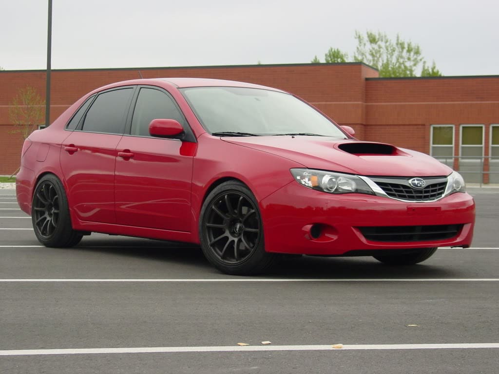 2010 Subaru Impreza with 18x9 Rota G-Force wheels